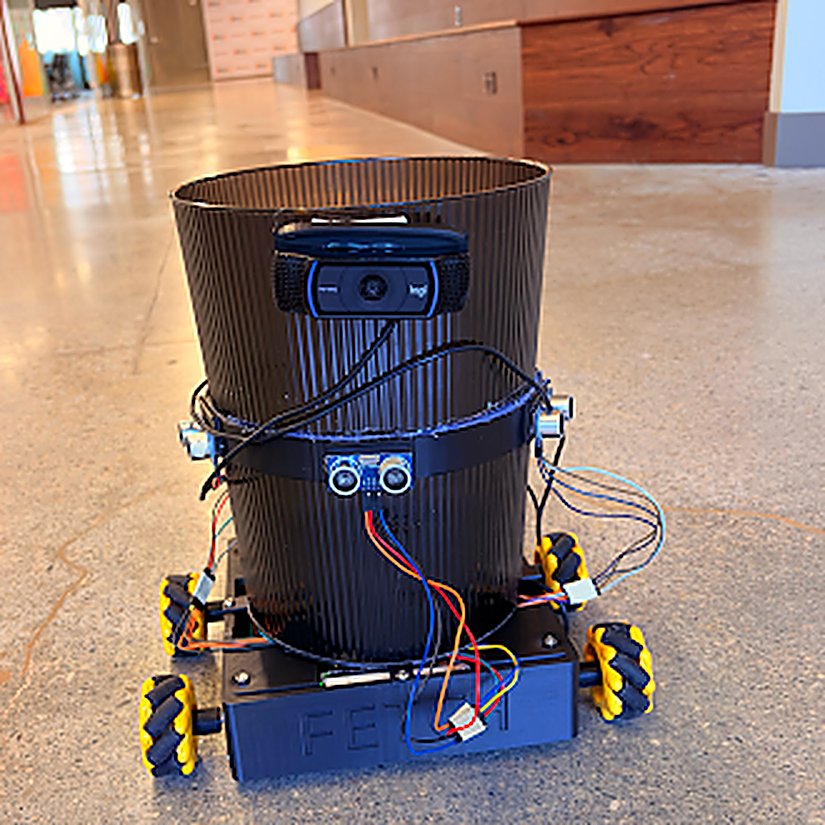 Fetch, a mecanum-drive robot with a trash-can body, on a tile floor