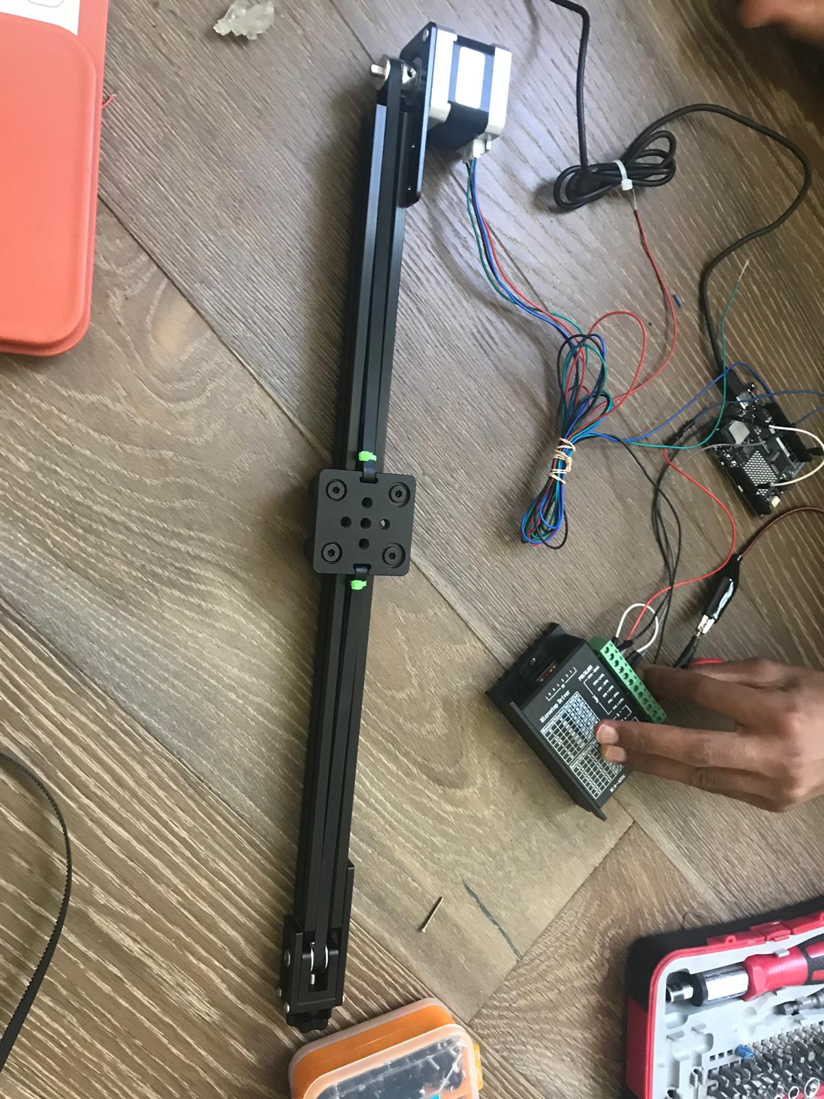 Hope's V-slot rail assembly with NEMA17 stepper, carriage, and TB6600 driver electronics